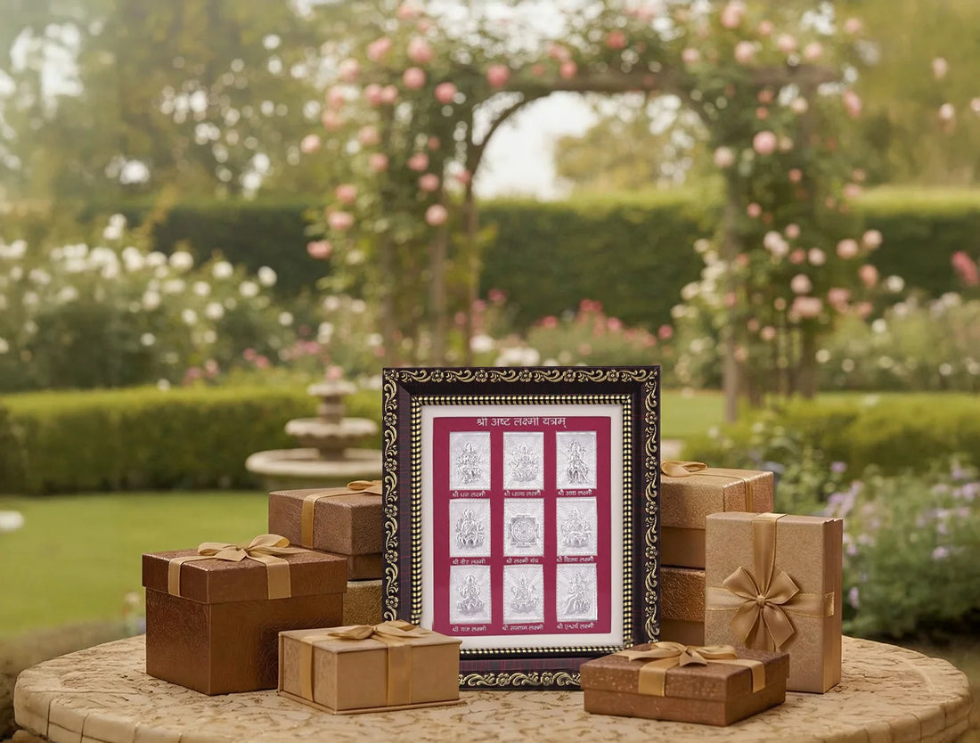 999 Pure Silver Ashta Laxmi Darshan wall mount framed with gift boxes in a garden setting