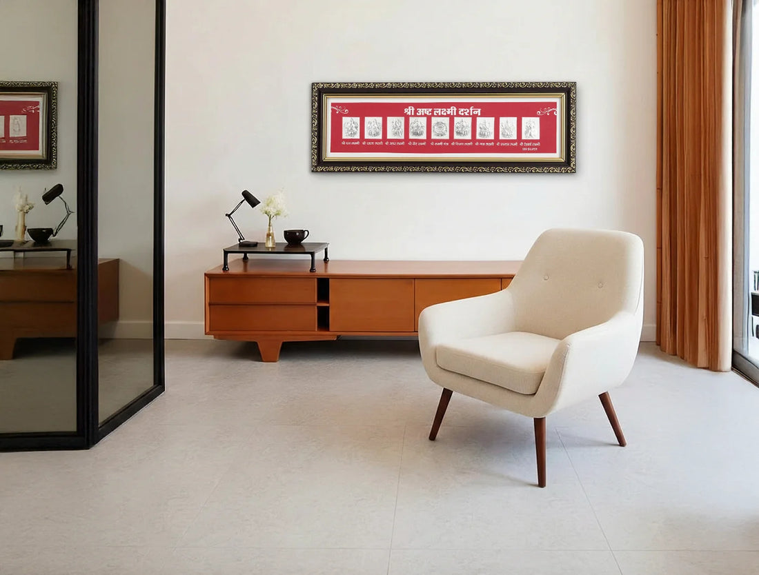 Silver frame featuring Ashta Laxmi design by Bhagwati Jewels, wall-mounted display with intricate silver craftsmanship.