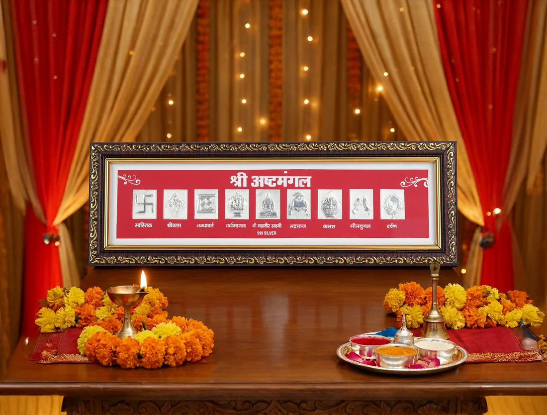 999 pure silver ashta mangal frame displayed on a decorated altar with flowers and diya.