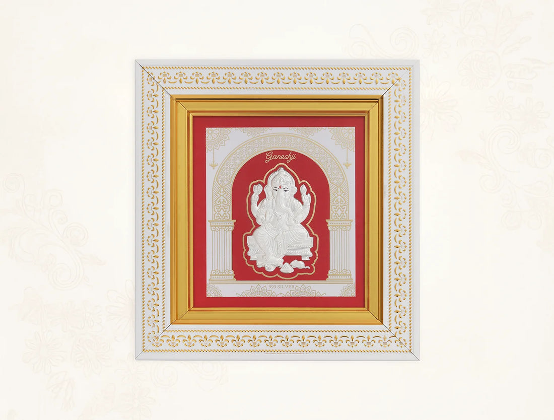 Pure silver Ganesh frame by Bhagwati Jewels featuring intricate divine Lord Ganesha design for home decor.
