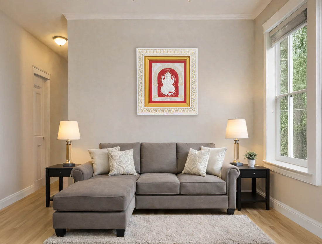 Silver Ganesh frame by Bhagwati Jewels featuring intricate design, perfect for divine home decor, crafted from 999 pure silver.