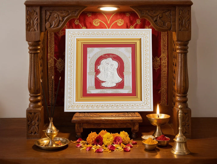 Pure silver Radhakrishna frame by Bhagwati Jewels, intricate divine home decor featuring detailed silver craftsmanship.