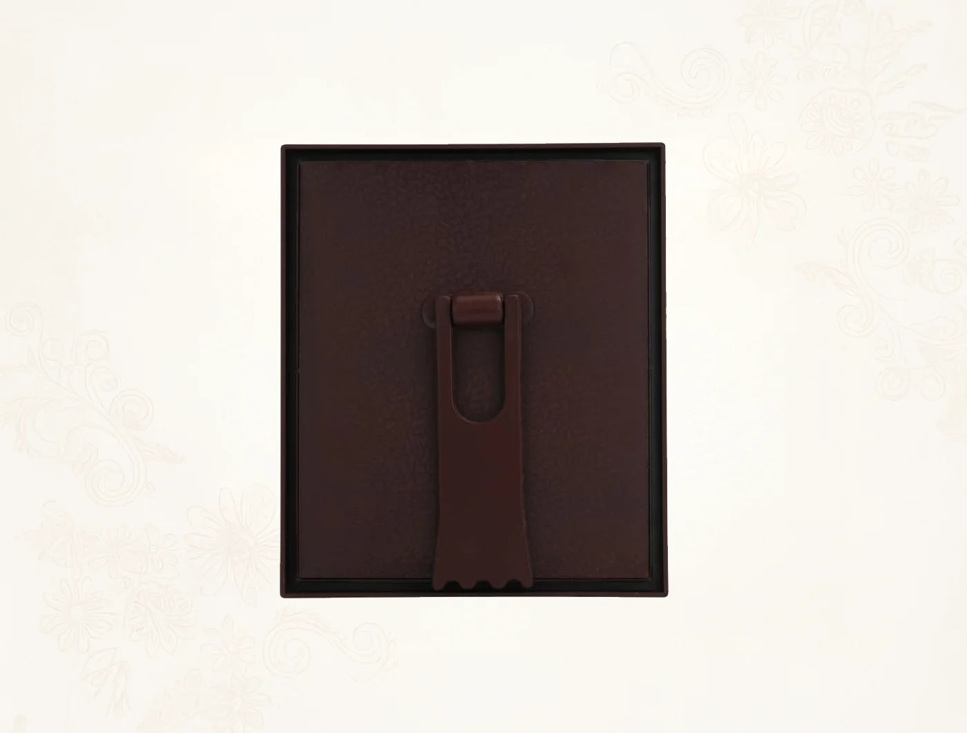 Back view of a 999 Pure Silver Ashta Ganesh Frame with a brown mounting hook for wall hanging.