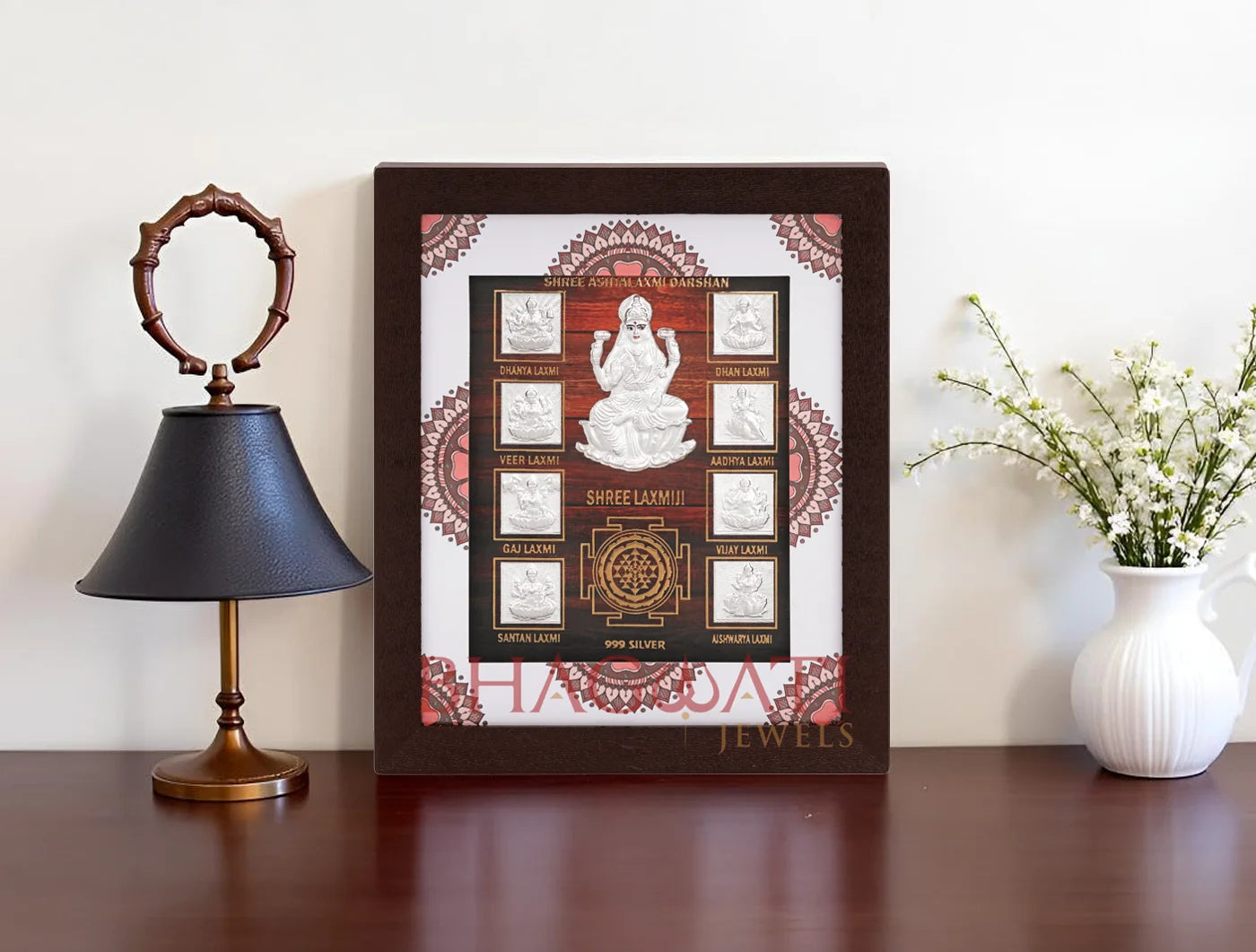 999 Pure Silver Ashta Laxmi Frame by Bhagwati Jewels featuring intricate silver craftsmanship for divine home decor.