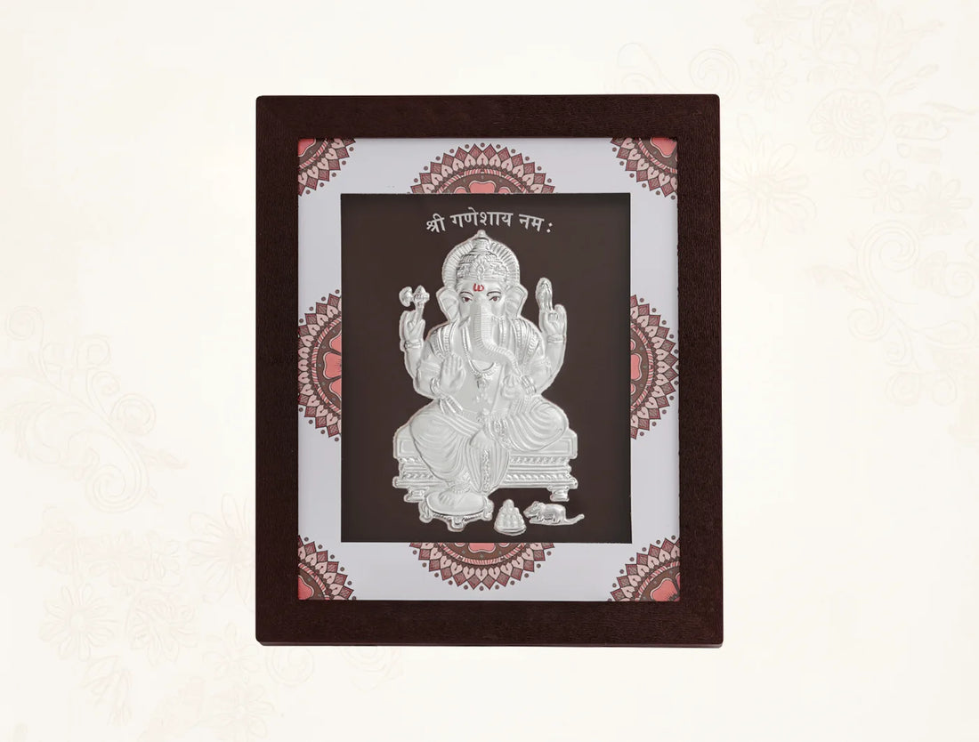 Square silver frame featuring a detailed Ganeshji design, ideal for home decor or gifting, by BHAGWATI JEWELS.