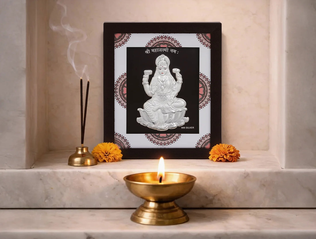 Hanging pure silver Laxmiji frame by Bhagwati Jewels, ideal for home decor or office desk, featuring intricate silver craftsmanship.