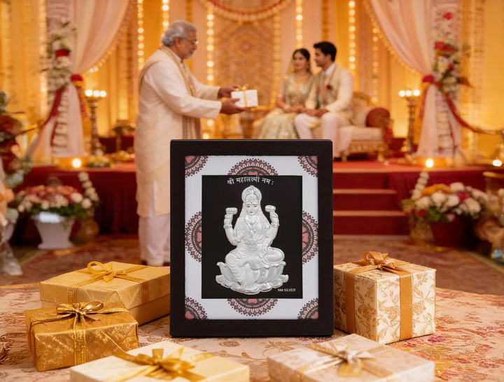 Silver Laxmiji frame by Bhagwati Jewels featuring a divine design, perfect for home decor or office desk display.