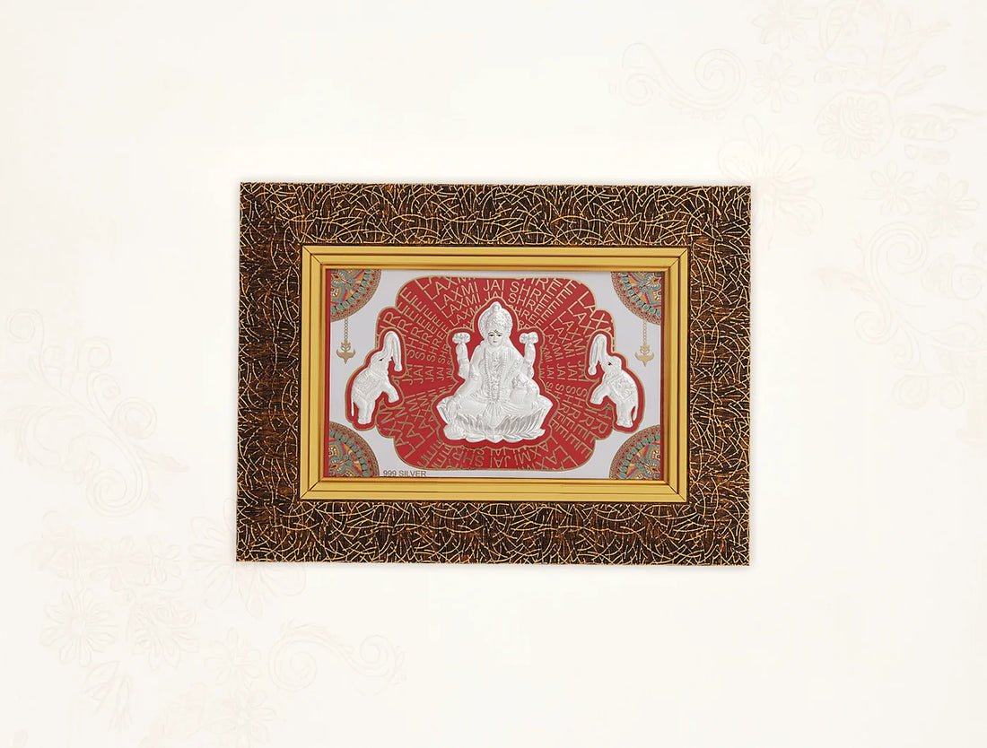 999 Pure Silver Laxmi Frame by Bhagwati Jewels, 13x10 inch wall-mounted divine home decor with intricate silver design for temple or office decor.