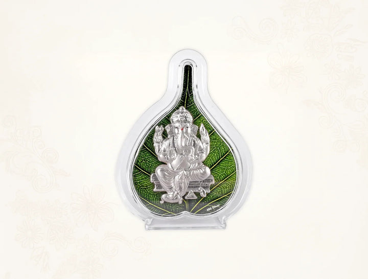 Silver Ganesh Green Pan Stand by Bhagwati Jewels featuring a 999 silver Ganesh idol with pooja pan for home, office, or hall decor.