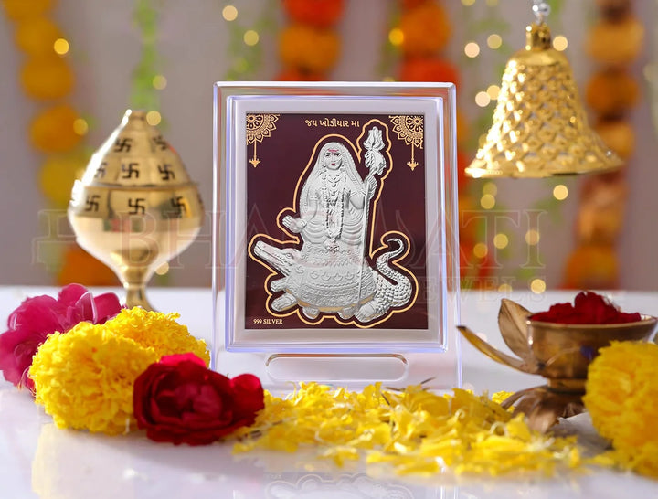 Silver frame Khodiyarmaa stand by Bhagwati Jewels, acrylic rectangular tabletop display for home or gift silver items, 7x5 inches.