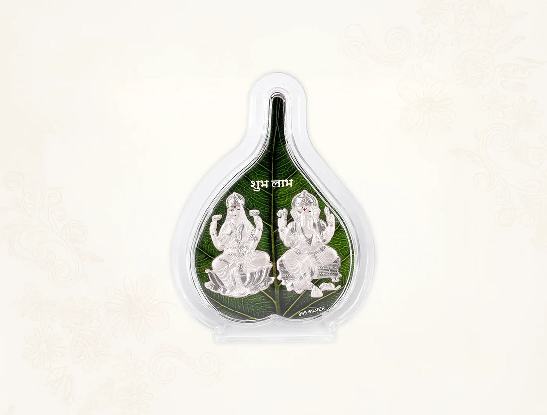 Silver frame Laxmi Ganesh green pan stand by Bhagwati Jewels, 7x5 inch tabletop decorative piece in pure silver.