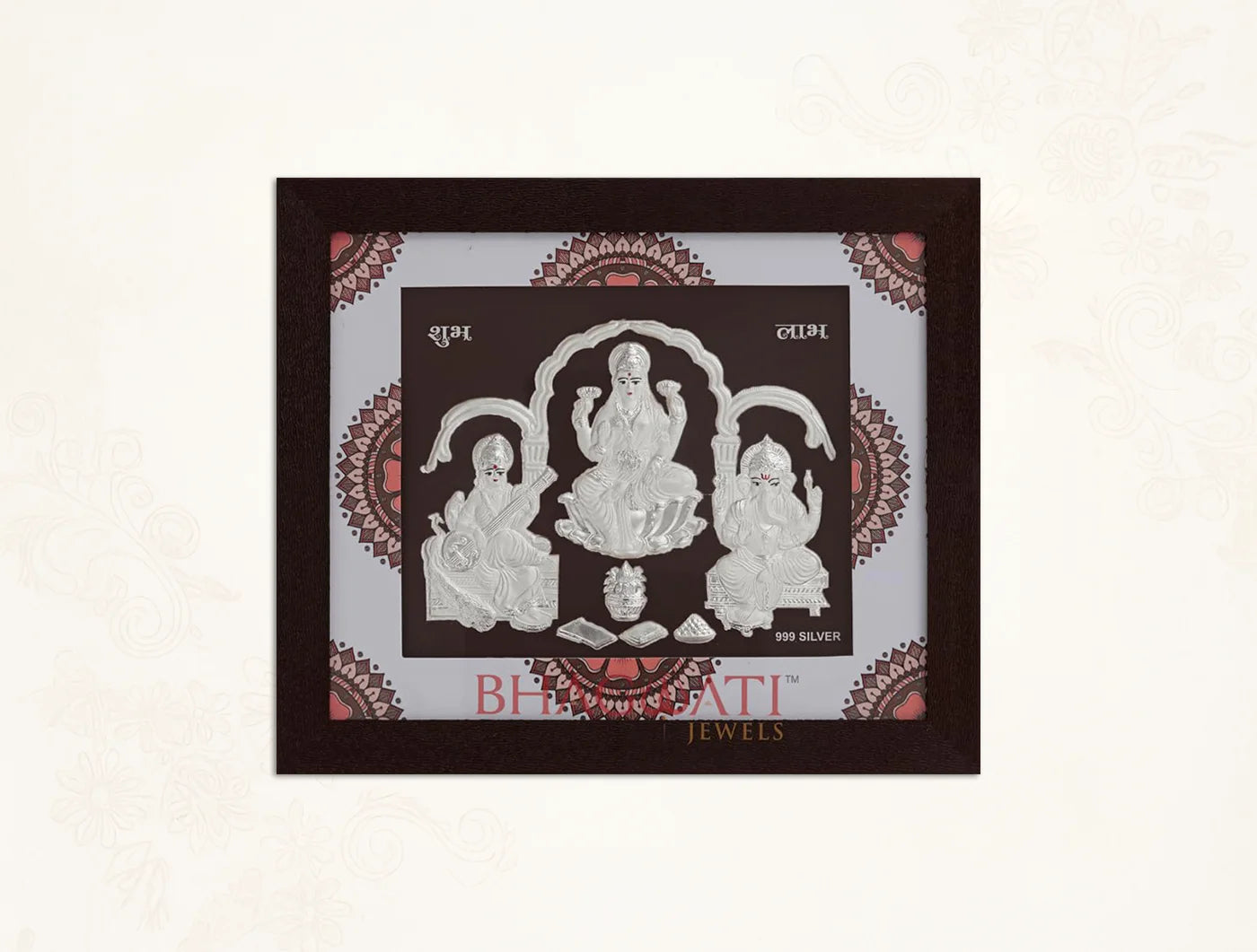 Square silver frame featuring Laxmi, Ganesh, and Saraswati images by Bhagwati Jewels, perfect for home or office decor.