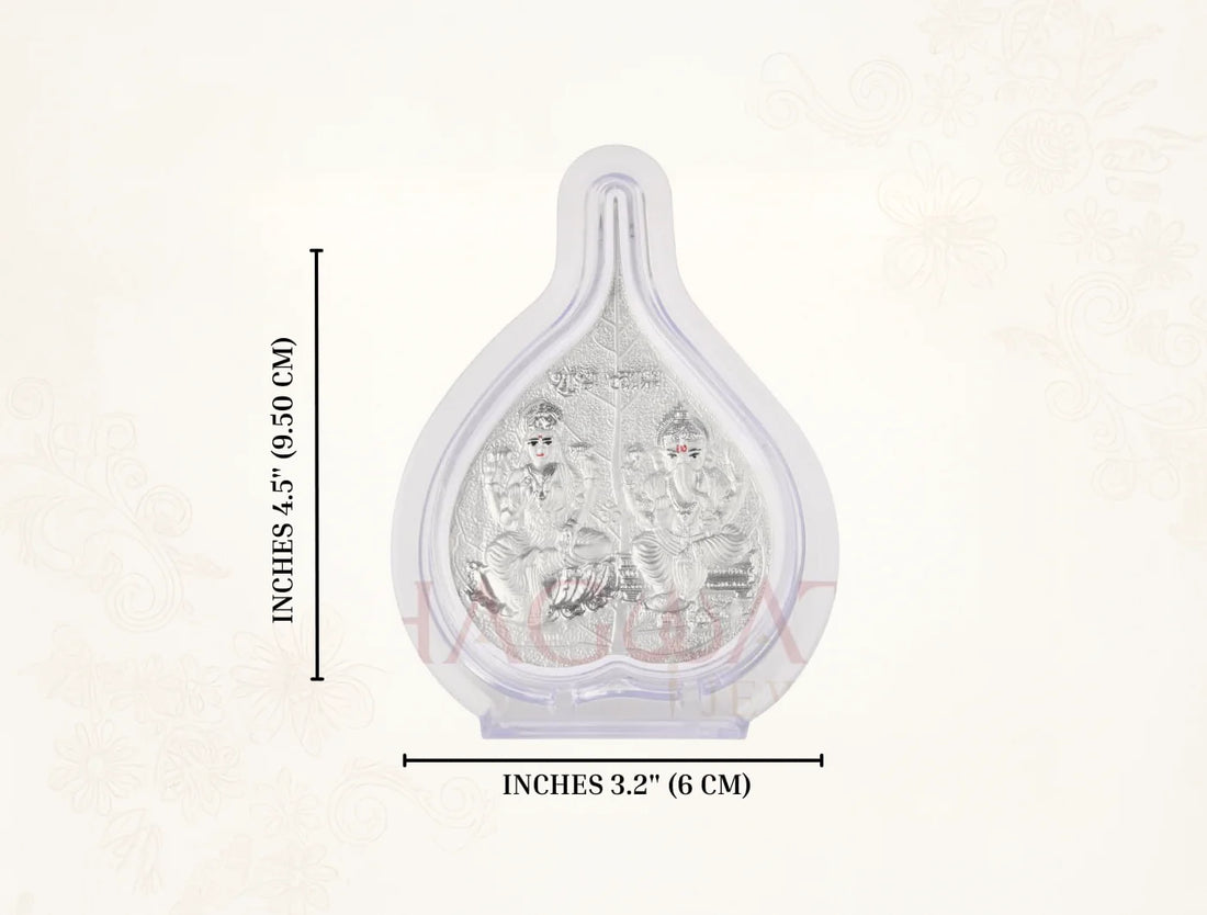 Silver frame featuring Laxmi Ganesh in pure silver by Bhagwati Jewels, tabletop display, 4.25x3 inches, ideal for spiritual or corporate gifting.