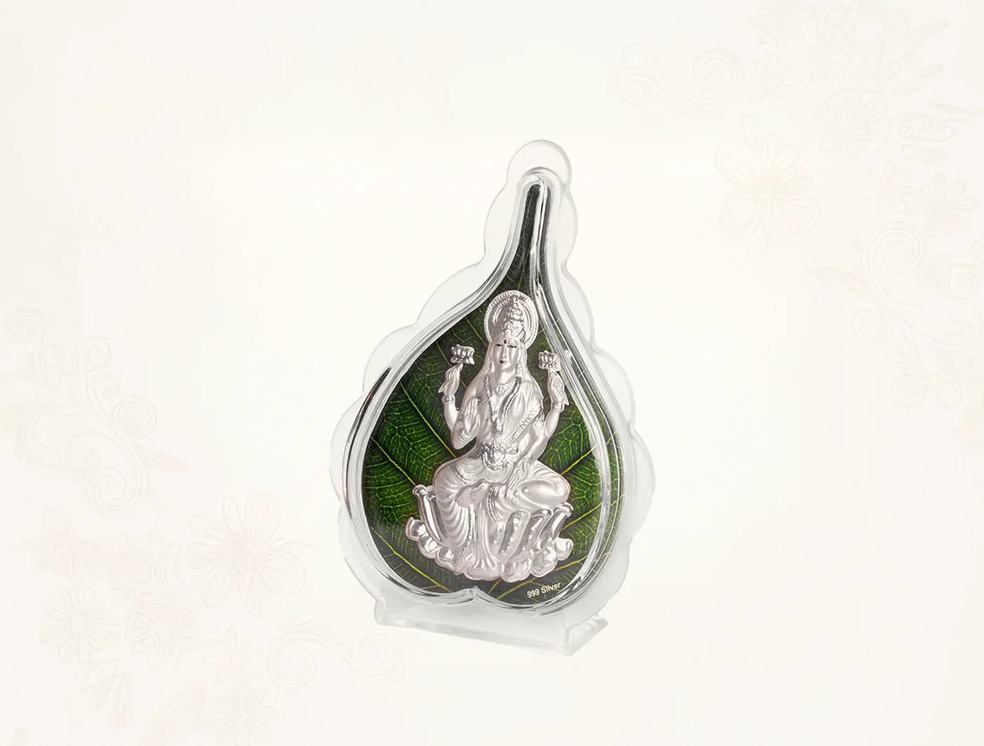 999 Pure Silver Laxmi Green Pan Stand displayed in a protective case with a green leaf design, perfect for decor.