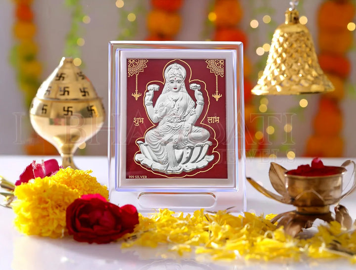 Silver Laxmiji stand with 999 pure silver frame, acrylic rectangle base, 7 x 5 inch size for religious decor.