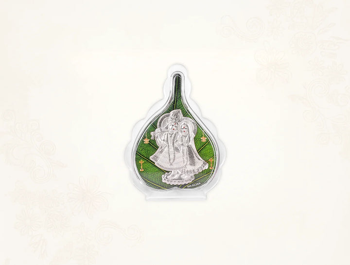 Silver Radhakrishna Green Pan Stand with intricate design, 7x5 inch silver frame for tabletop display by Bhagwati Jewels.