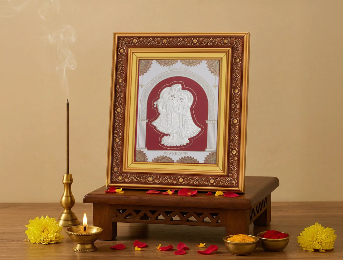 Square wall-mounted Radhakrishna silver frame with copper accents, crafted in 999 pure silver by Bhagwati Jewels.