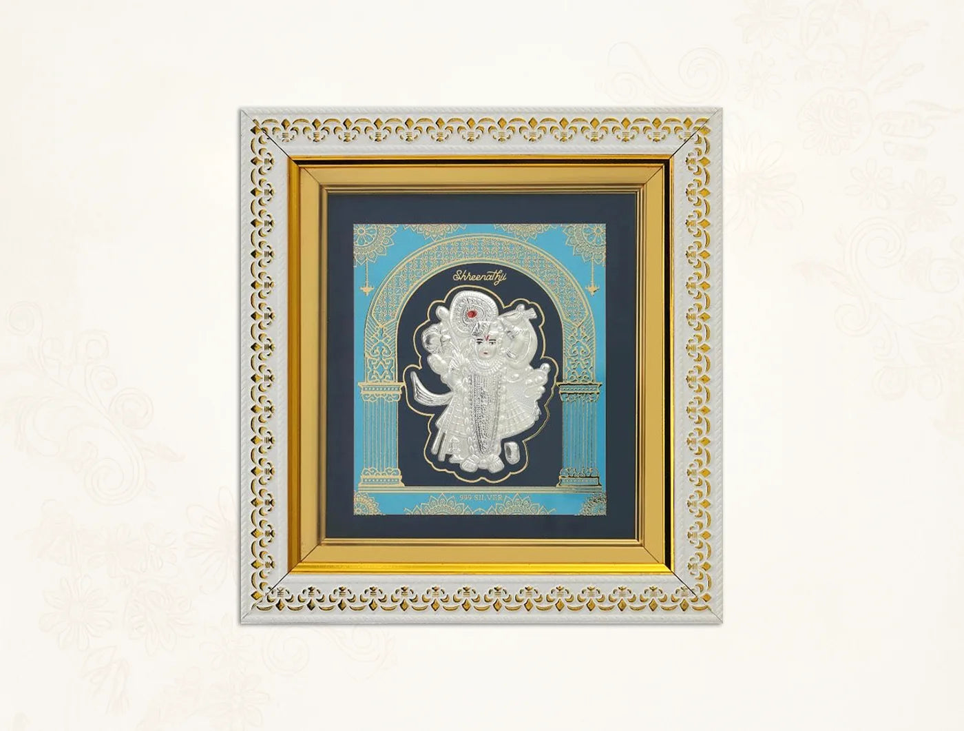 Silver frame featuring a Shrinathji design, 8x7.5 inches, crafted by Bhagwati Jewels for wall display in pure 999 silver.