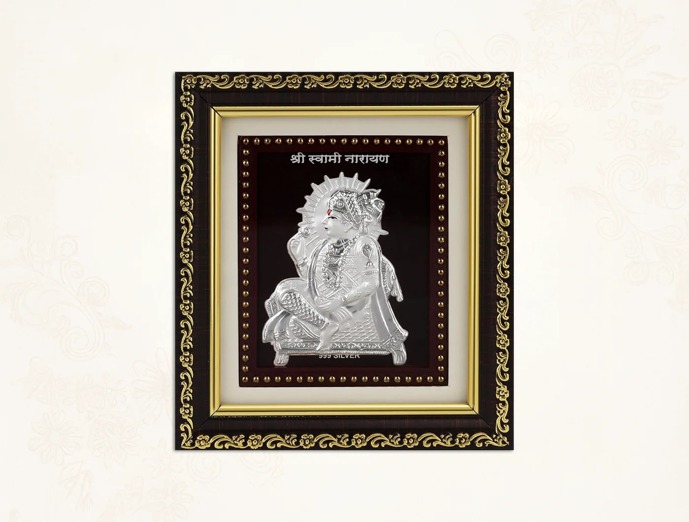 999 Pure Silver Swaminarayan photo frame in a decorative gold frame, ideal for home decor and gifting.