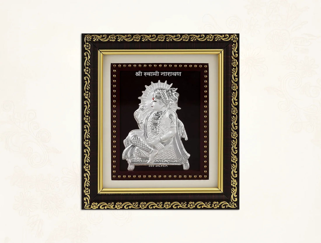 999 Pure Silver Swaminarayan photo frame in a decorative gold frame, ideal for home decor and gifting.