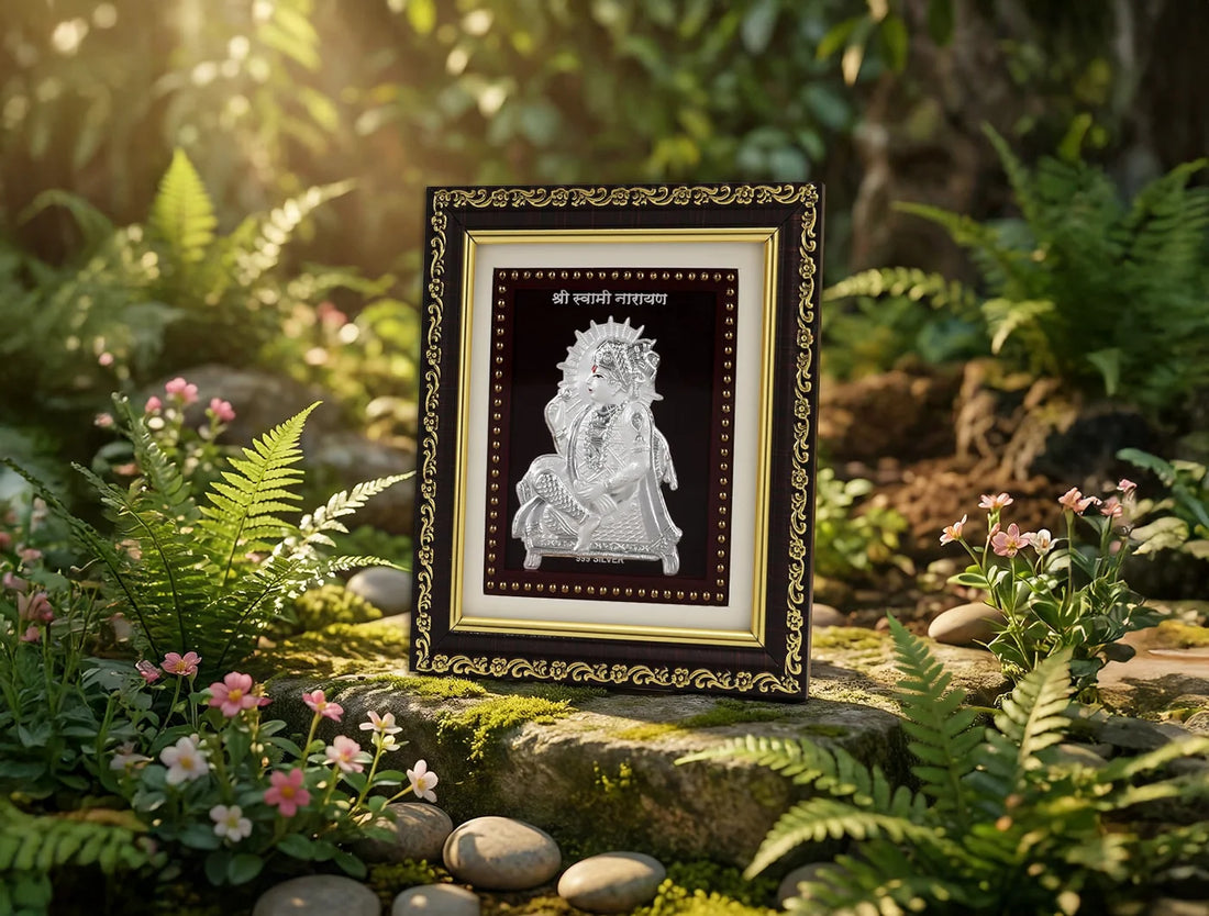 999 Pure Silver Swaminarayan photo frame displayed in a natural garden setting, ideal for decor and gifting.